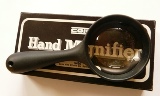 Afbeelding van een handloepje, merk coil; lensgrootte 47 mm.